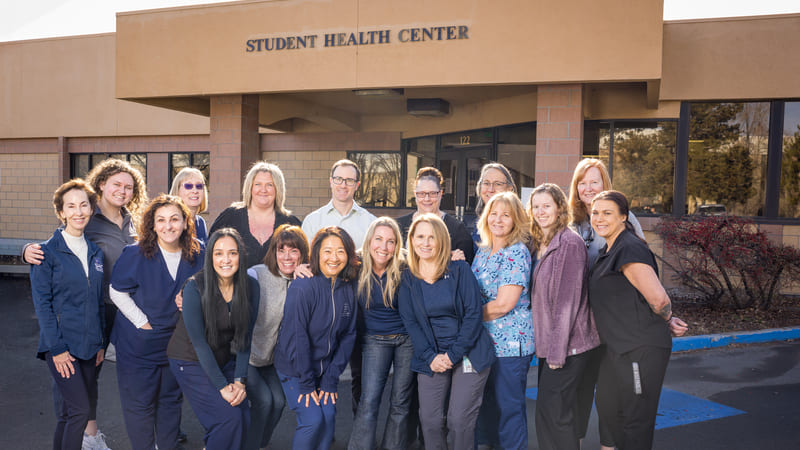 Student Health Center staff in front of their facility