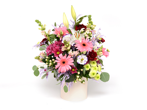 A bouquet of bright flowers, representing the monthly bouquet received by 12 Months of Flowers Card purchasers/recipients