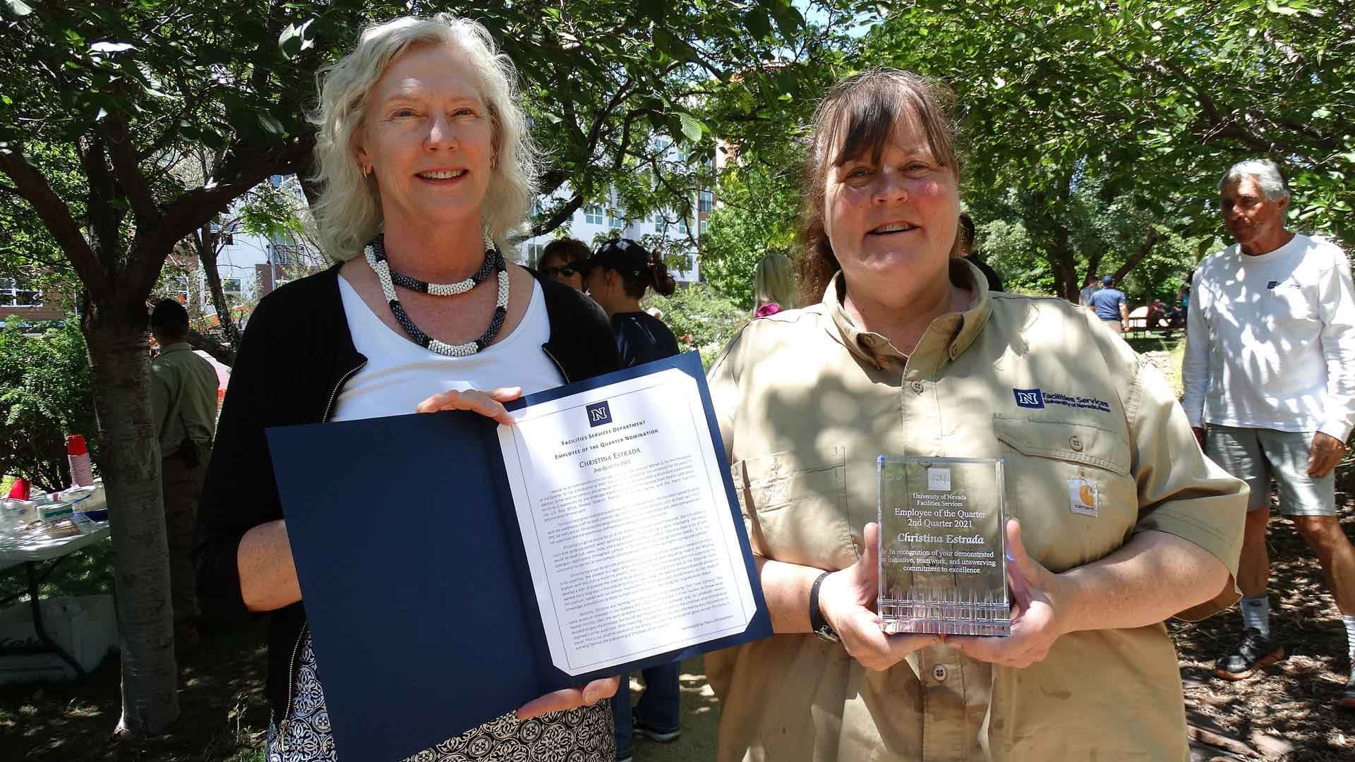 Christina receiving her award from Denise Baclawski