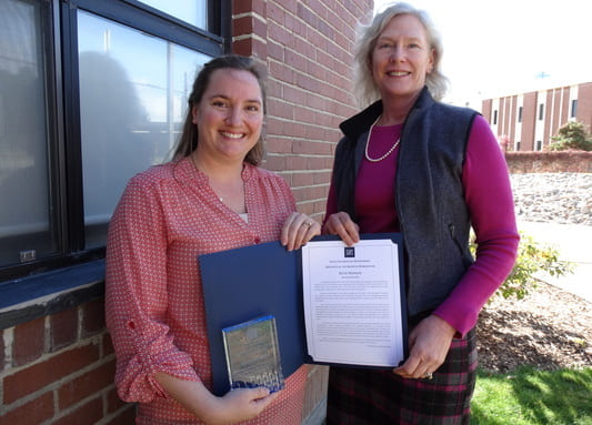 Christina receiving her award from Denise Baclawski