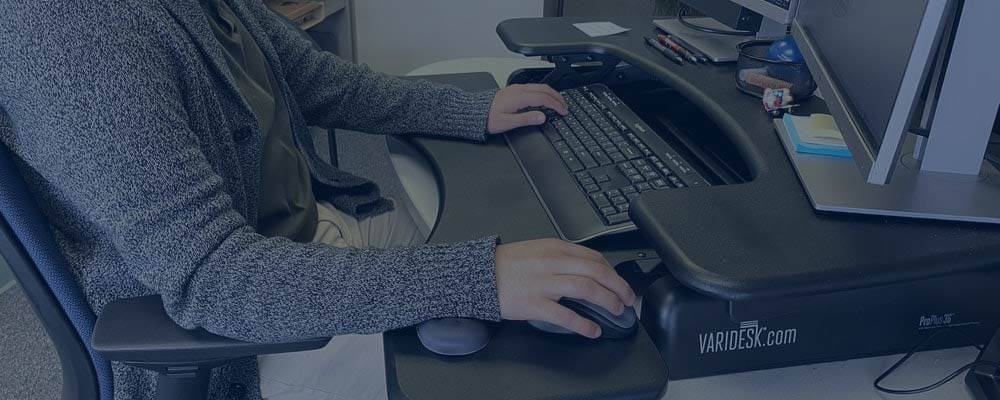 Employee sitting at computer