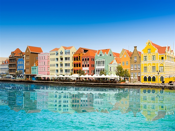 Willemstad with colorful buildings and body of water in front
