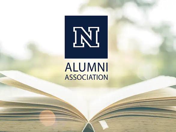 The Nevada Alumni Association logo over an open book.