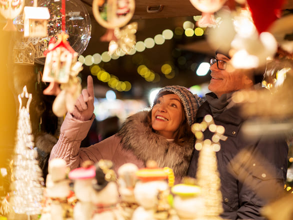 A mature couple browsing a gift shop by the Rhine River