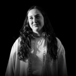 Black and white headshot of Kacey Fowler