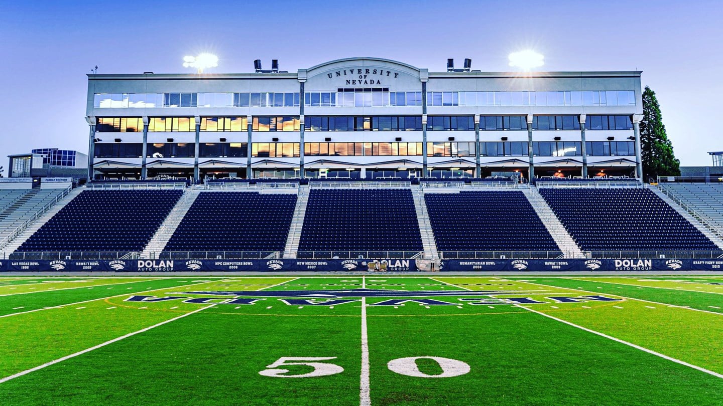 A view of Mackay Stadium's seat and press box and the football field at the 50-yard line.