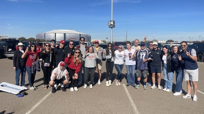Members of the Arizona Alumni Chapter gathered at the parking lot outside of the State Farm Stadium in Glendale, Arizona.