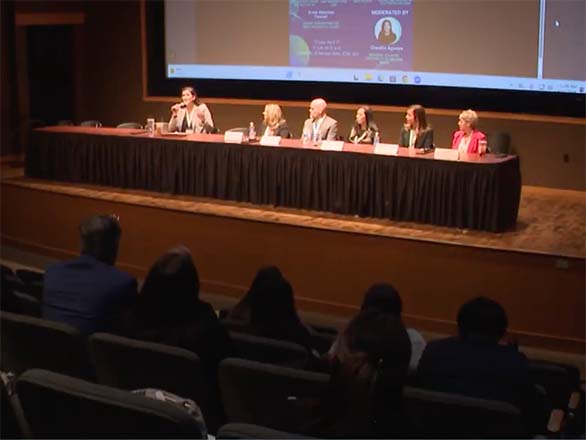 Presenters at a panel discussion