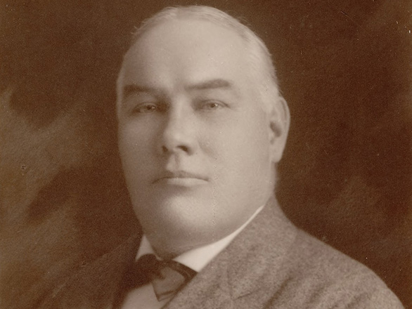 Black and white headshot of Archer Hendrick