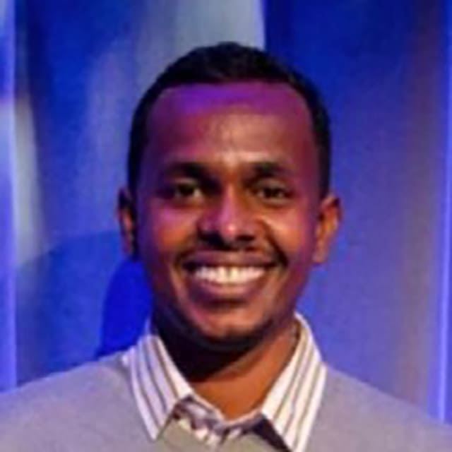 Headshot of Abdou Idris Omar