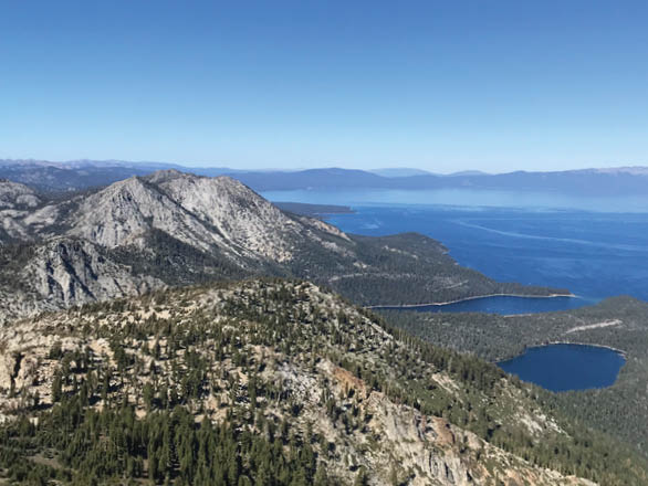An aerial view of South Lake Tahoe on a clear day with blue skies.