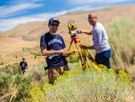 Field research team in a high desert environment.