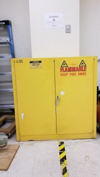 A cabinet labeled for flammable material