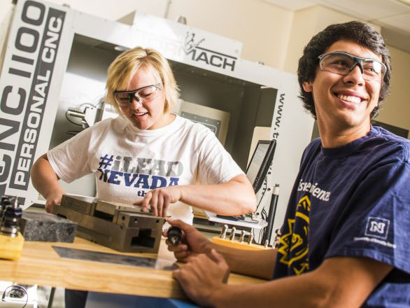 Two students working in the Innevation Center Makerspace fabrication lab