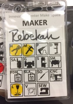 The front of a safety badge color-coded for a maker-in-training