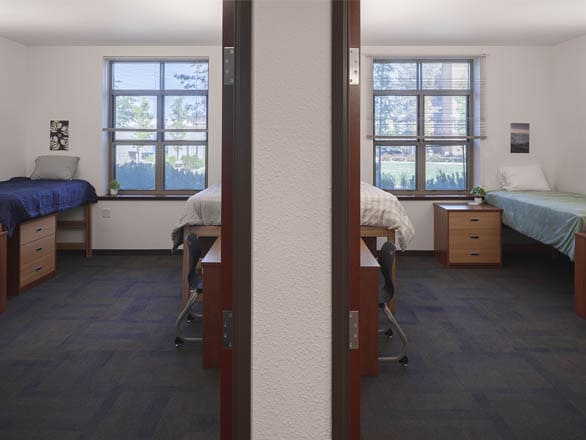 Two separate bedrooms shown side by side, each with a twin bed, desk, and large window. Neutral tones and simple décor create a calm, functional environment.