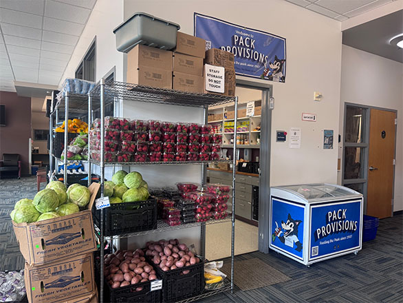 Pack Provisions office with speed racks filled with food.