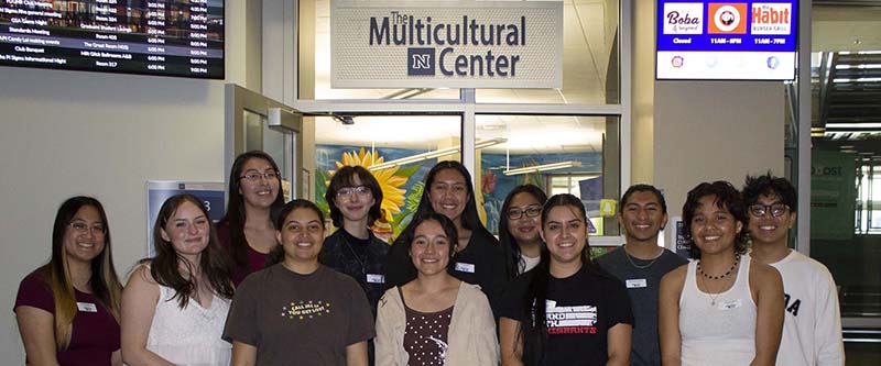 A group of students from the Multicultural Center gather in the Joe Crowley Student Union.