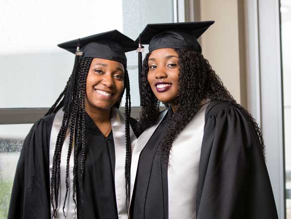Two graduates at the African Diaspora Graduation Celebration