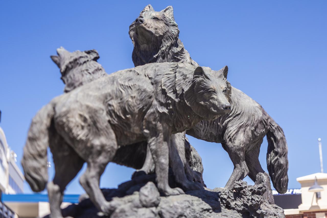 Statue of three wolves located at Mackey Stadium.