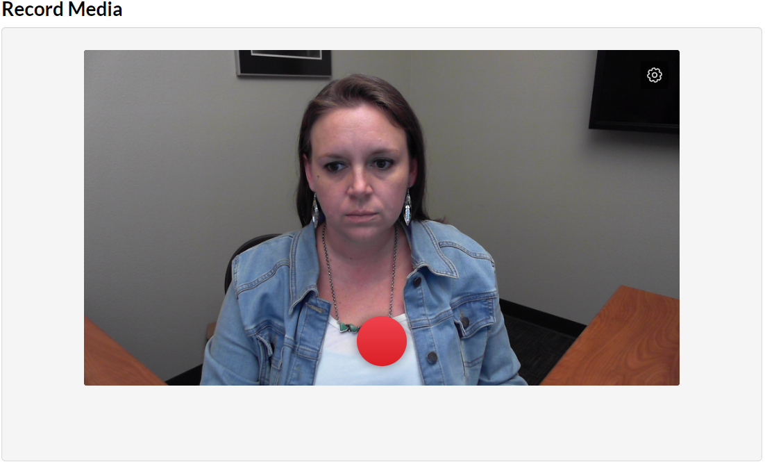 Screen clipping of the Record Media area of the Express Capture tool in WebCampus. The recording preview area is shown. The record button is in the lower center of the preview window and the Gear icon for setting is located in the upper right-hand corner.