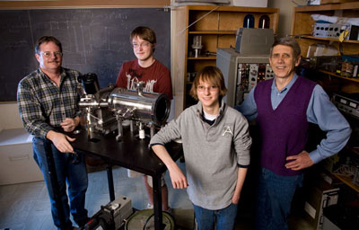 From left: William Brinsmead, a University principal research and design tech; Tristan Rasmussen, Davidson Academy student; Taylor Wilson, Davidson Academy student; and Ron Phaneuf, professor of physics. Photo by Theresa Danna-Douglas.