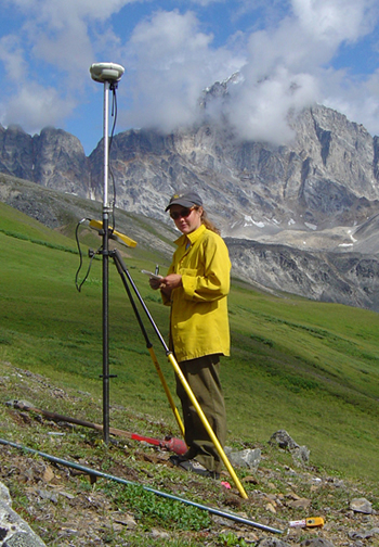 Hansen used GPS to record an exact location for setting up a surveying monument on Revelation Mountain, AK.