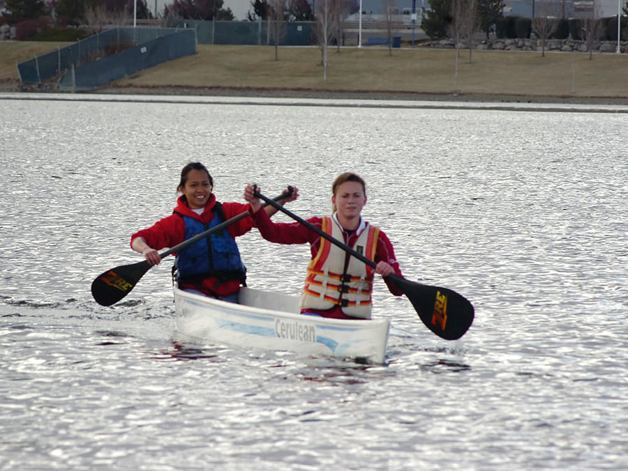 concrete canoe team practices at Sparks Marina