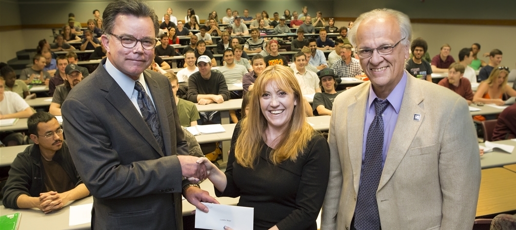 Candice Bauer receiving check