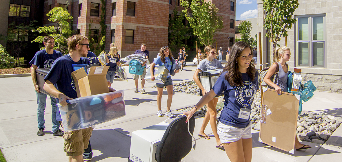 Students move stuff into dorms.