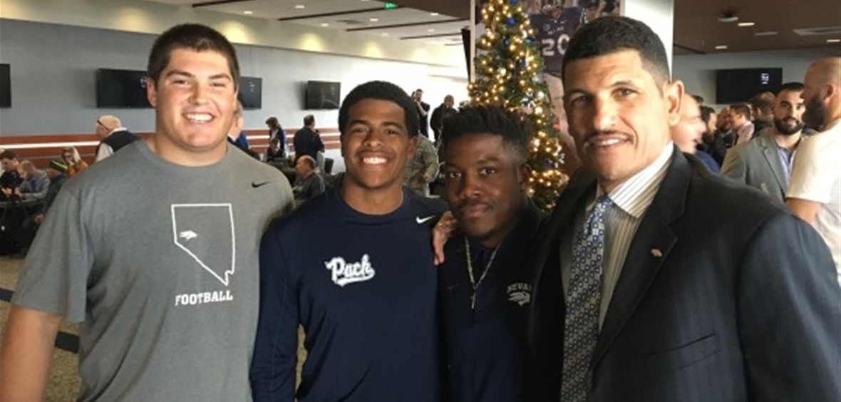 Coach Jay Norvell and three Wolf Pack players before his press conference
