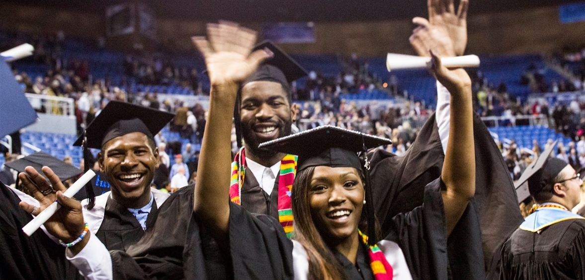 Happy students at winter commencement ceremony