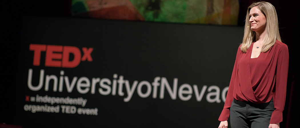 TEDxUniversityofNevada emcees, Danae Leer, a University MBA student, and Tim Grunert, an UNSOM student and past TEDxUniversityofNevada speaker, on stage at the event