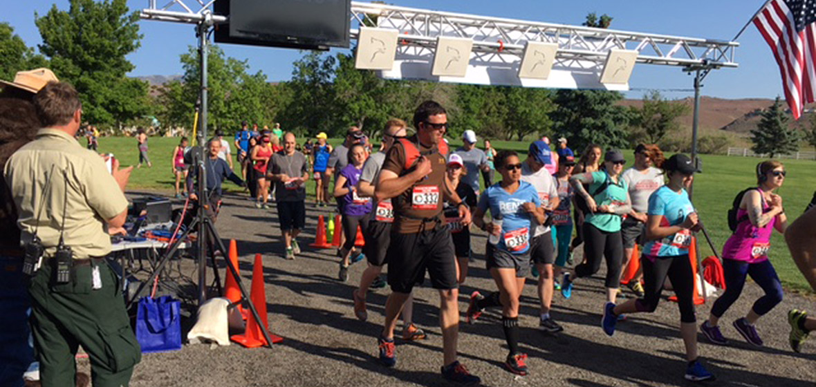 Participants running through Rancho San Rafael Park