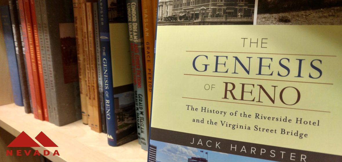 The Genesis of Reno book with other University of Nevada Press books on the shelf