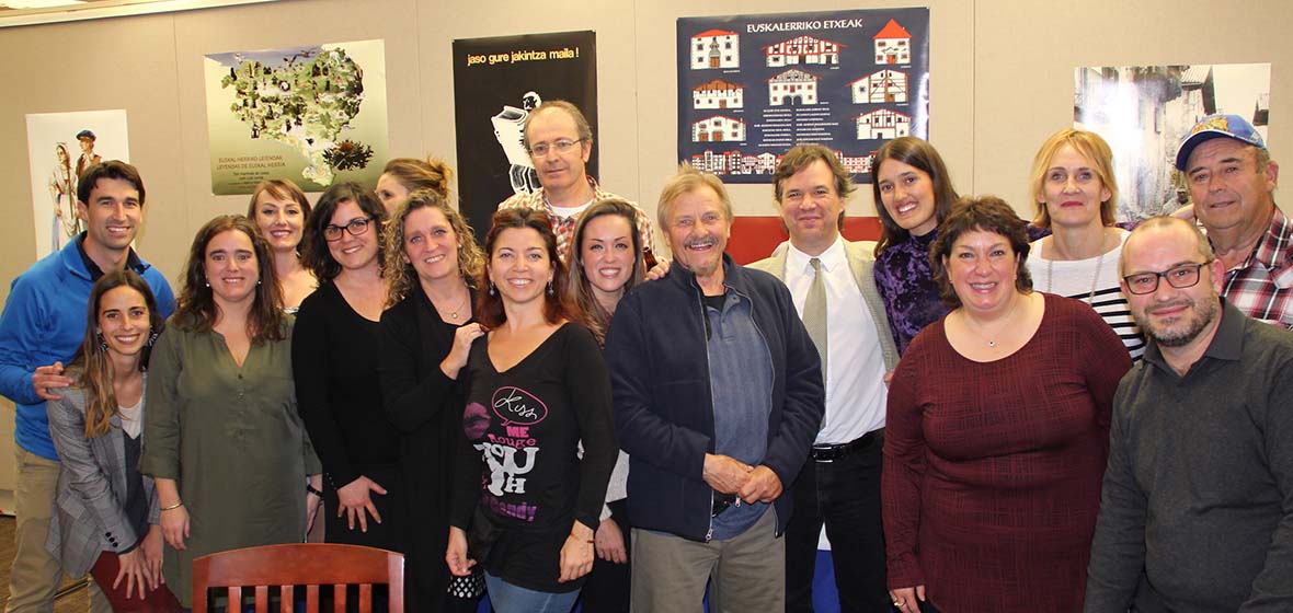 Group of people pose in Basque library during 50th anniversary reception for the Center for Basque Studies