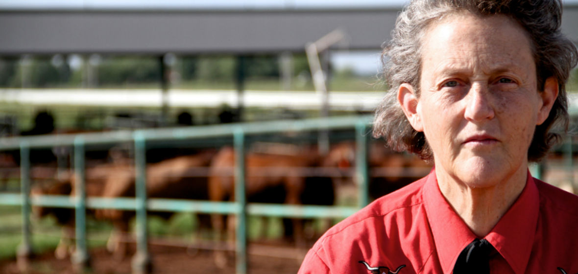 Temple Grandin in front of one of her facilities