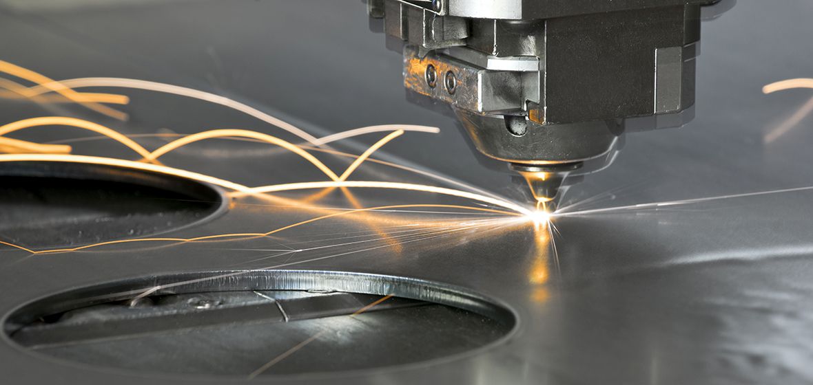 Laser manufacturing machine cutting steel