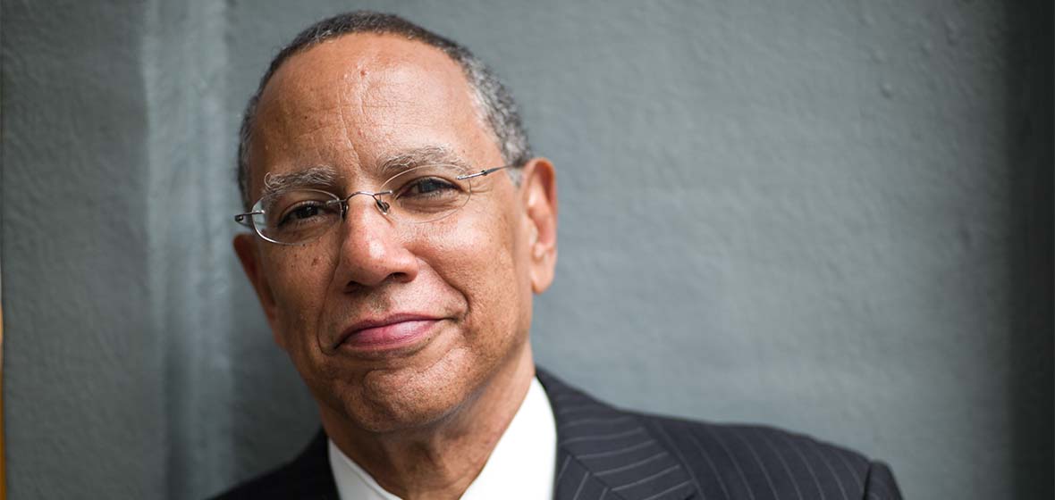 Dean Baquet poses for the camera. 