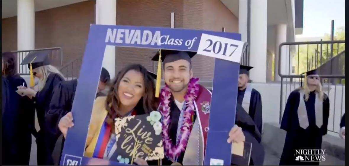 Two University graduates hold Nevada Class of 2017 photo frame 