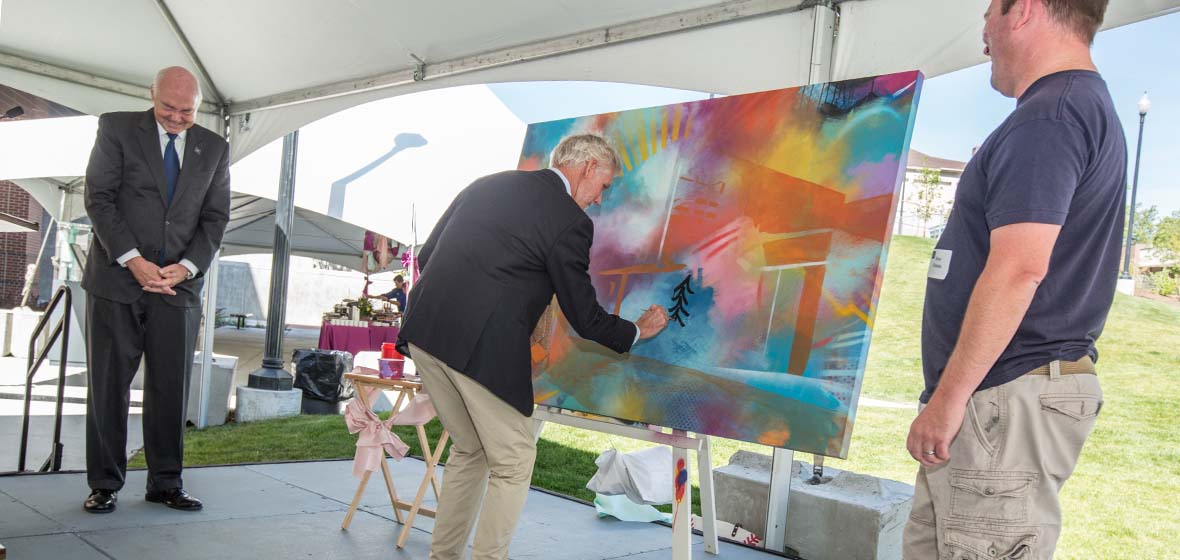  University of Nevada, Reno President Marc Johnson, Nevada System of Higher Education Chair Rick Trachok and artist Bryce Chisholm at groundbreaking event