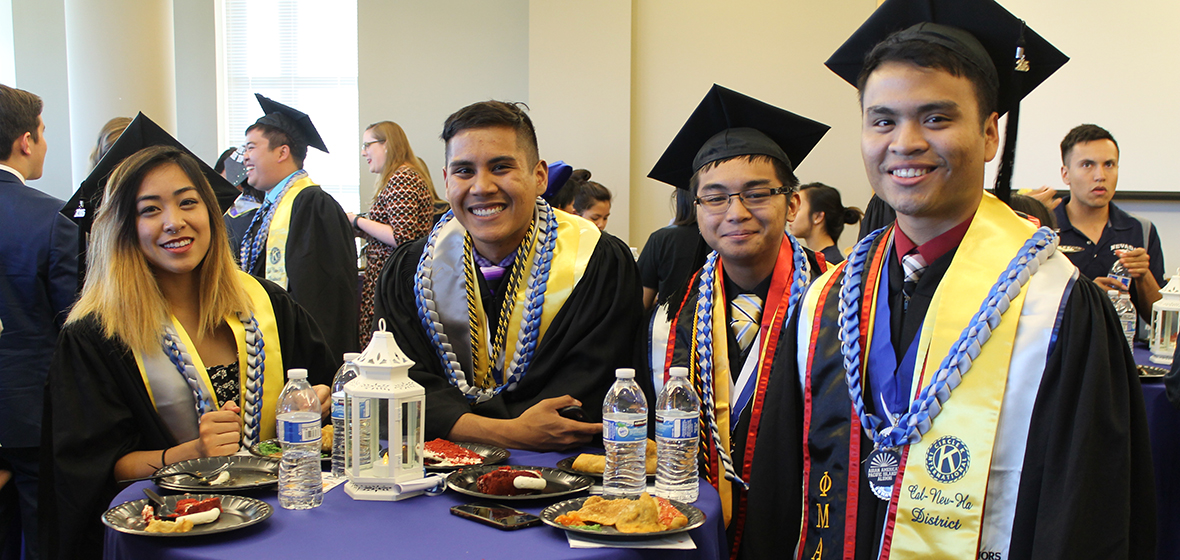 Four graduates at the Asian American and Pacific Islander Graduate Celebration