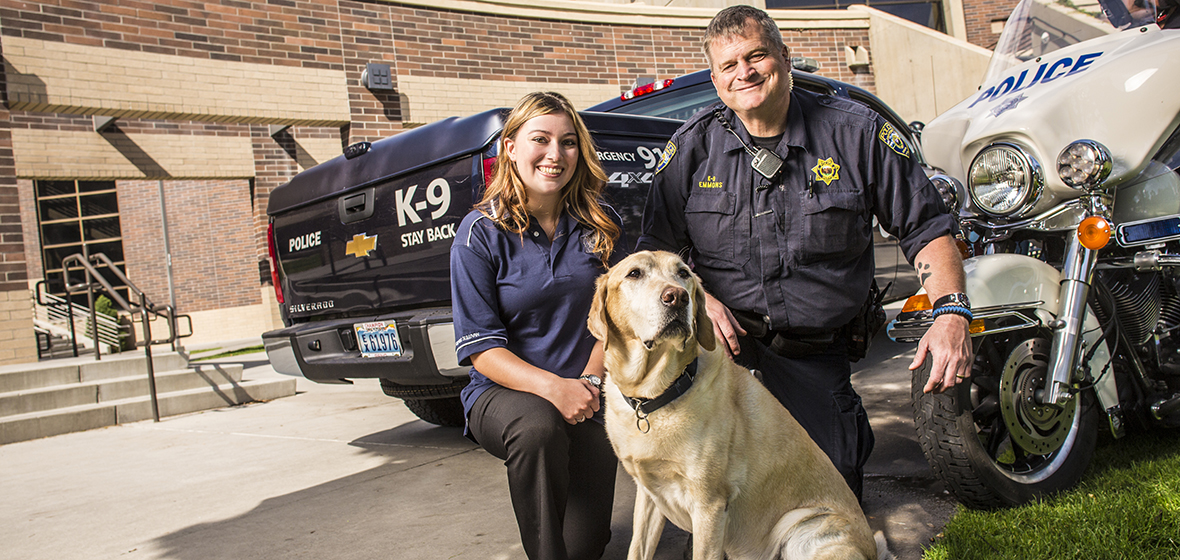 Officer Thomas Evans and his dog Turner accompanied by a female police officer (name unknown)