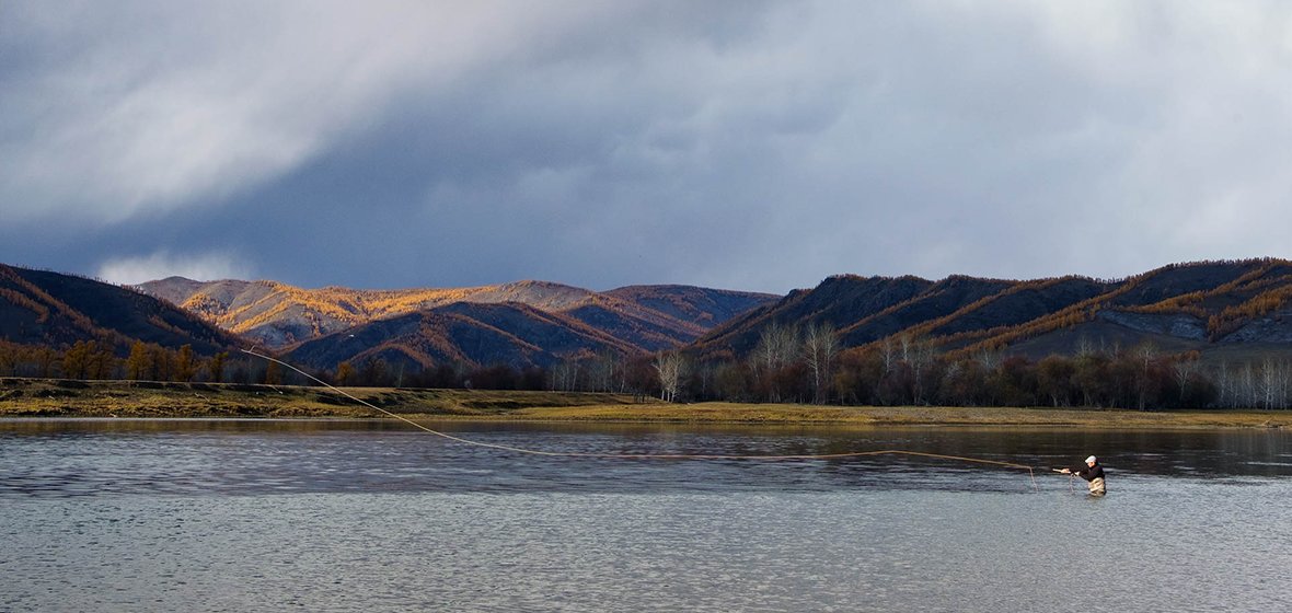 College of Science researcher fly fishing