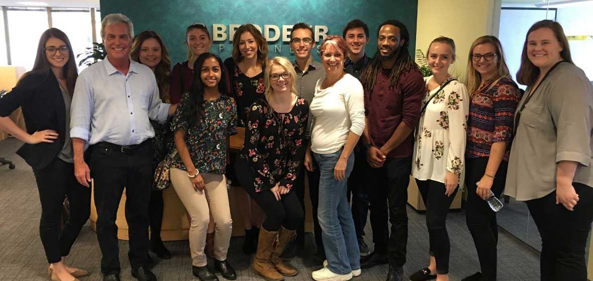 A group of people pose for a picture.