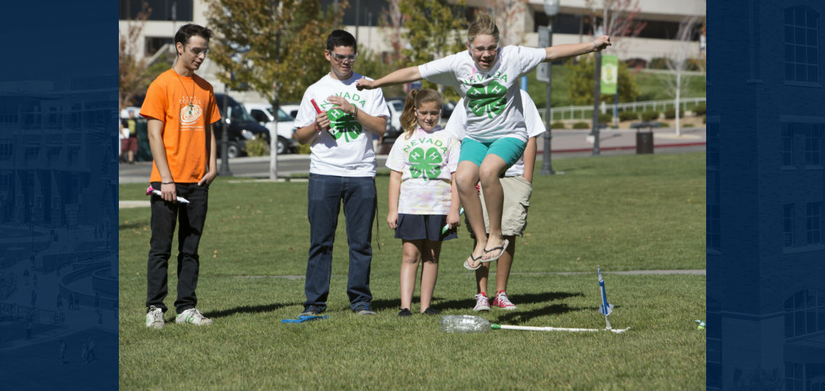 A 4-Her launces a rocket at a past 4H National Youth Science Day.