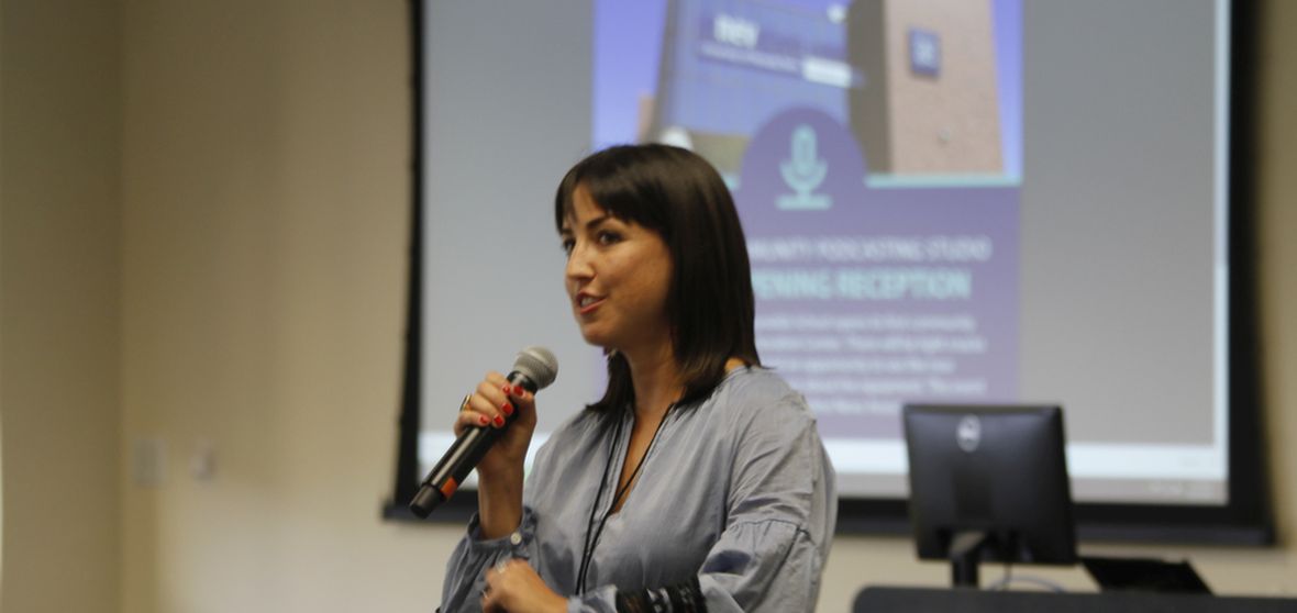 Reynolds School faculty member Vanessa Vancour addresses an audience