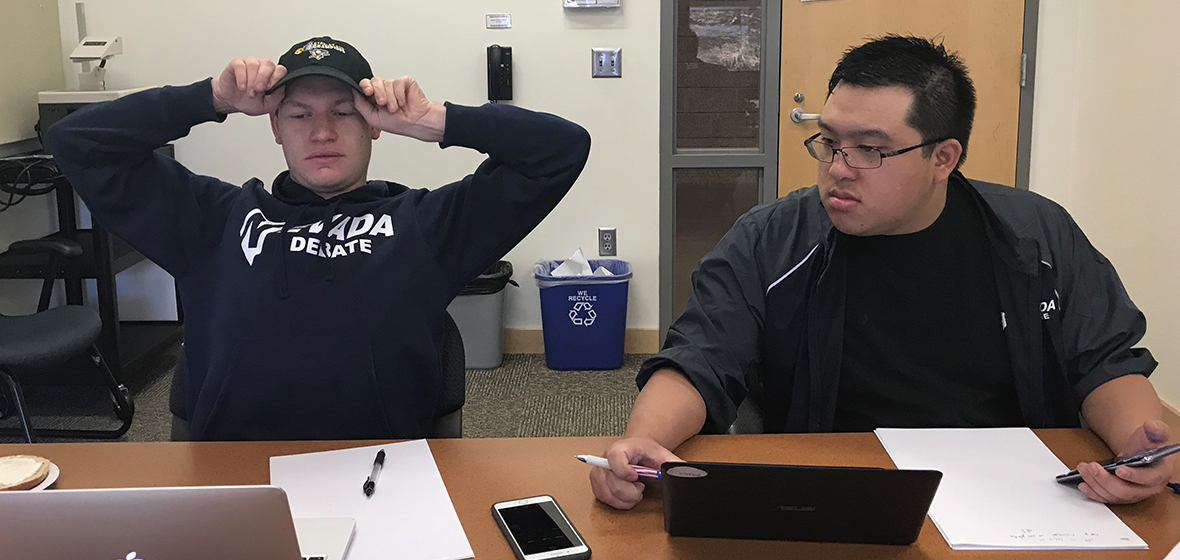 University students Josh Nelson and Sean Thai prepare for the 2018 National Debate tournaments