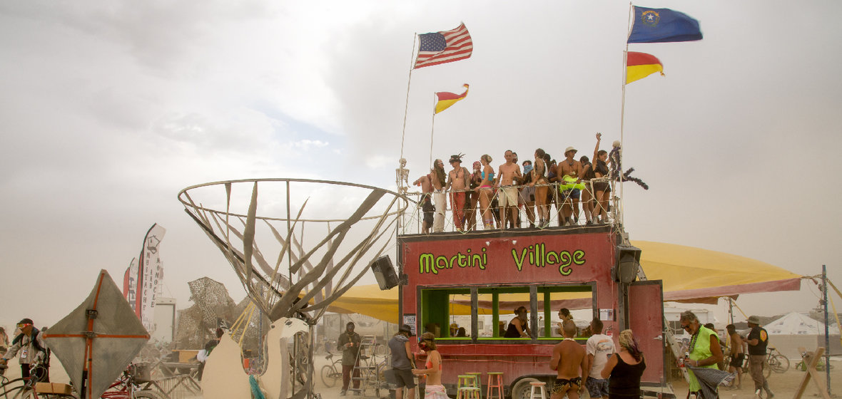 Photo of people having fun at Burning Man's Martini Village