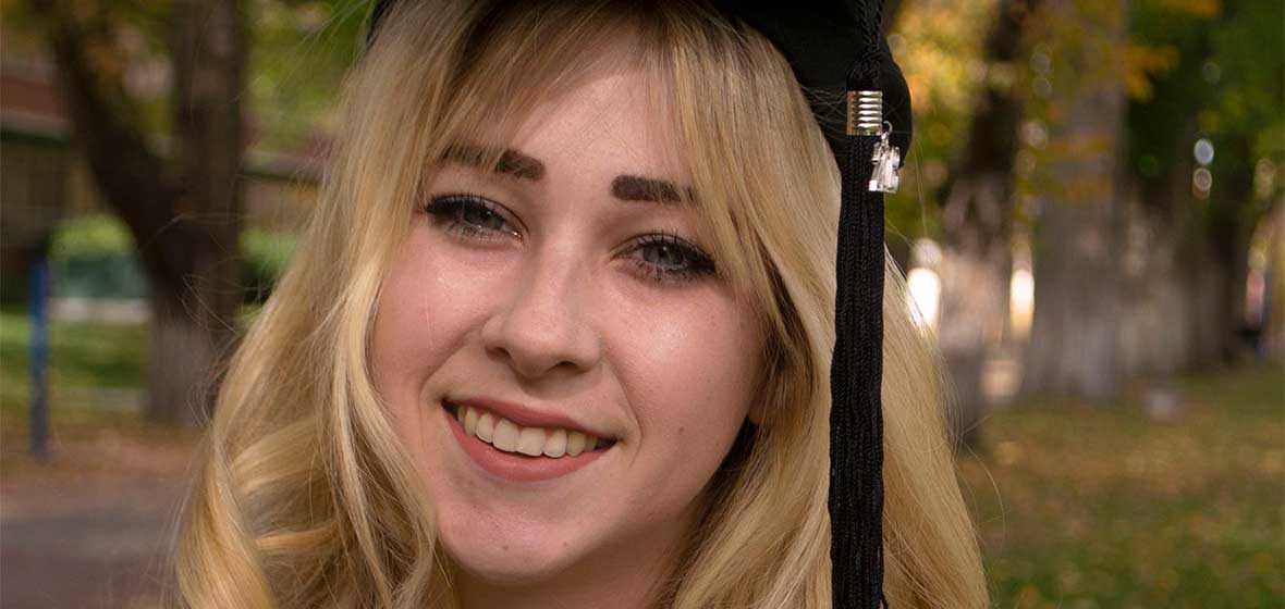 A woman in a graduation cap